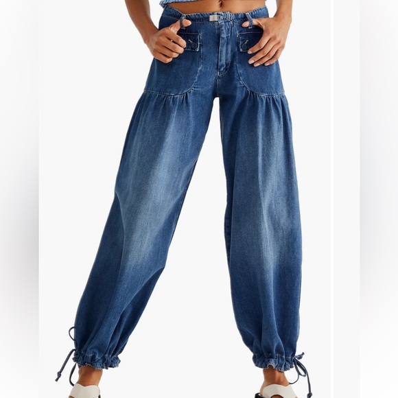 Free People Lotus High Waist Tie Hem
Barrel Leg Jeans - Picture 1 of 10